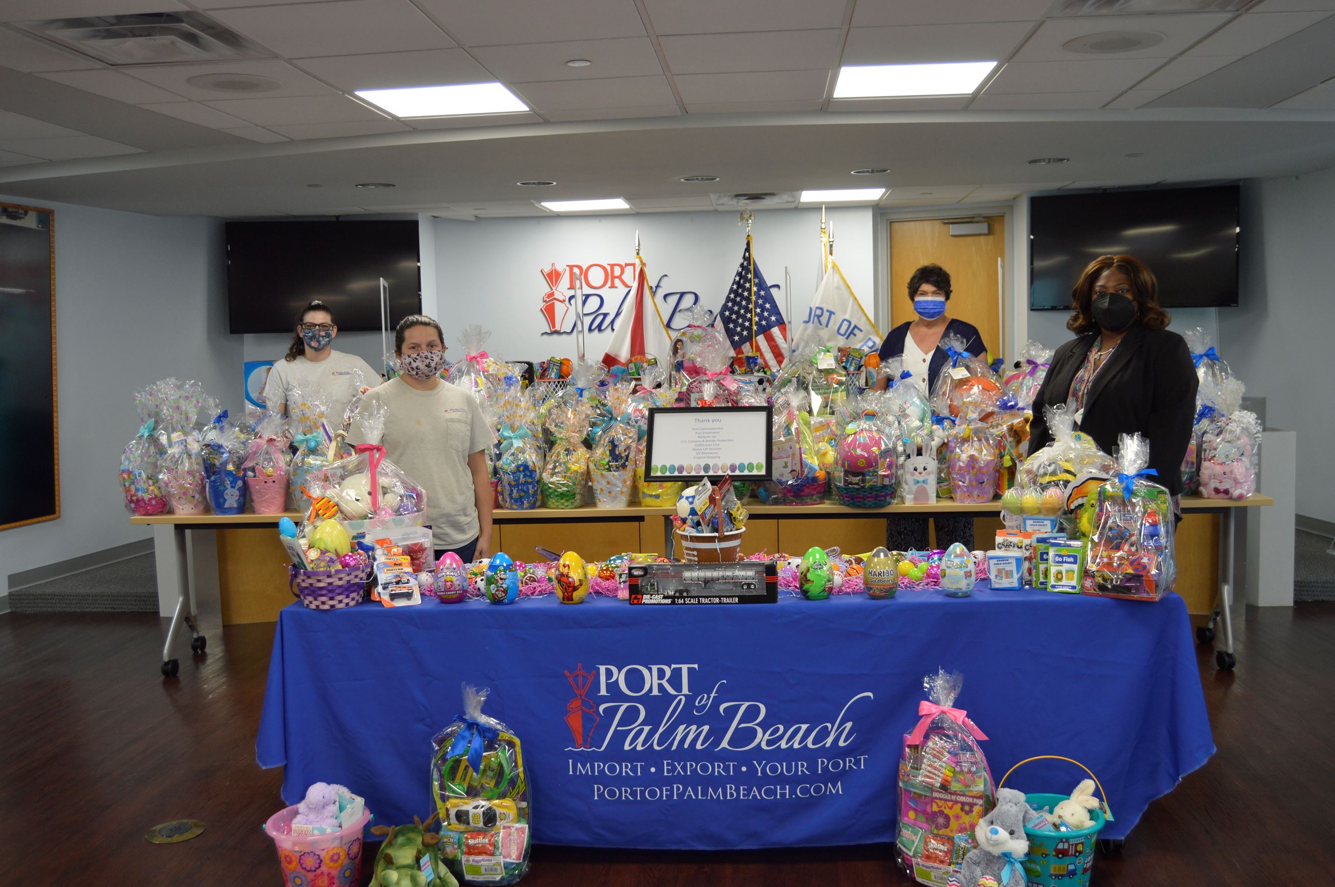 Port staff members and All Star Plumbing reps with more than 70 Easter baskets