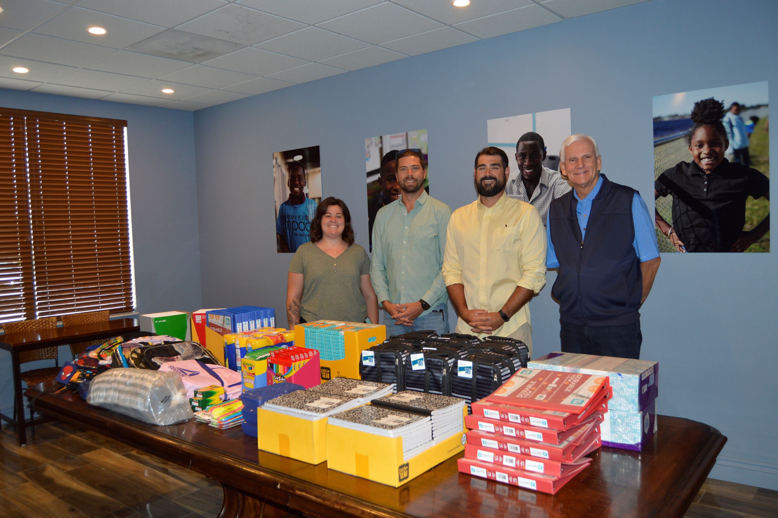 Cemex Terminal Manager Matt Horne and SE Hay President Alex Christiansen with Urban Youth Impact rep