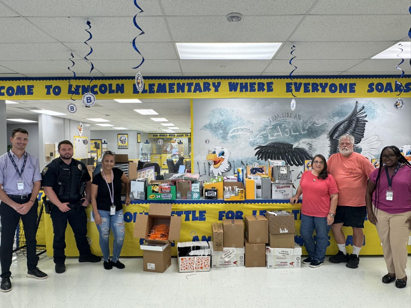 Tina and Glen with Heavy Lift Services at Lincoln Elementary