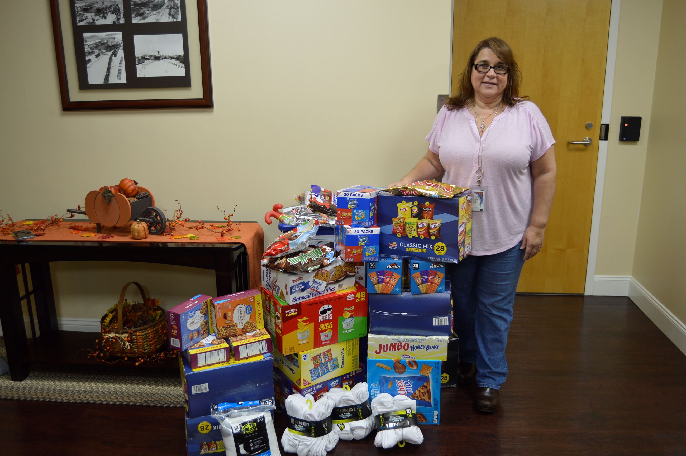 Tina Dias with Heavy Lift Services and Gulfstream Line donates goodies