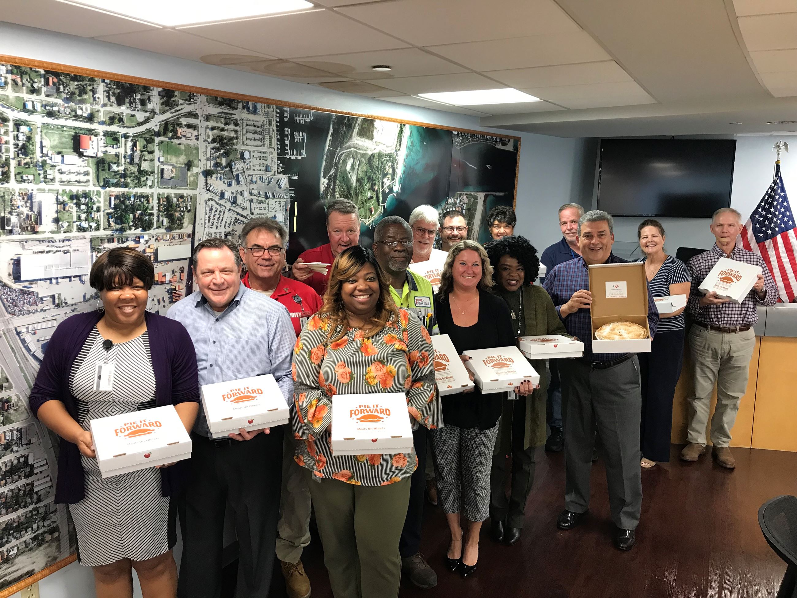 Port staff receiving pies