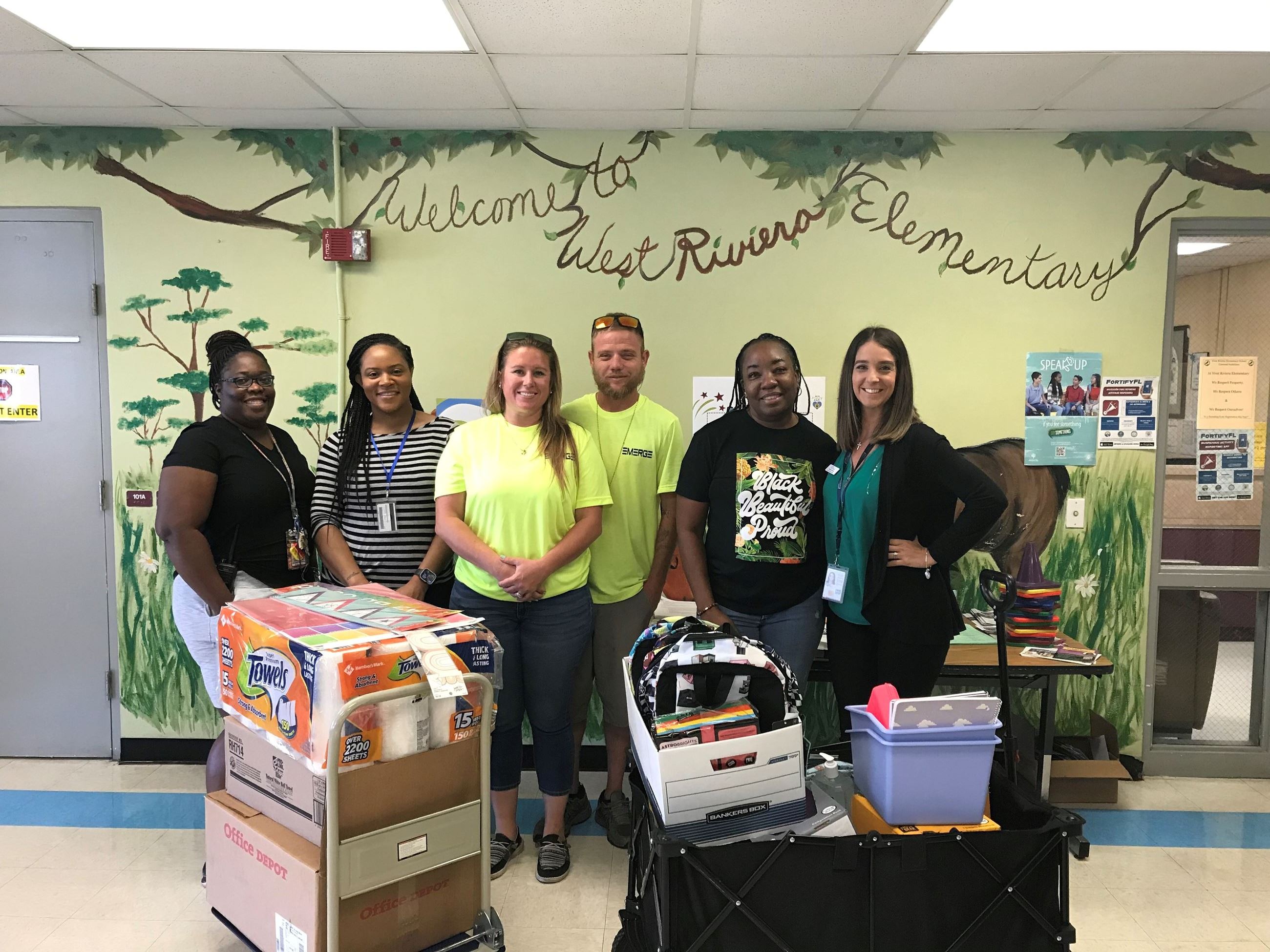 RJ and Lisa Black, PIO Yaremi Farinas and West Riviera Principal Dr. McKnight