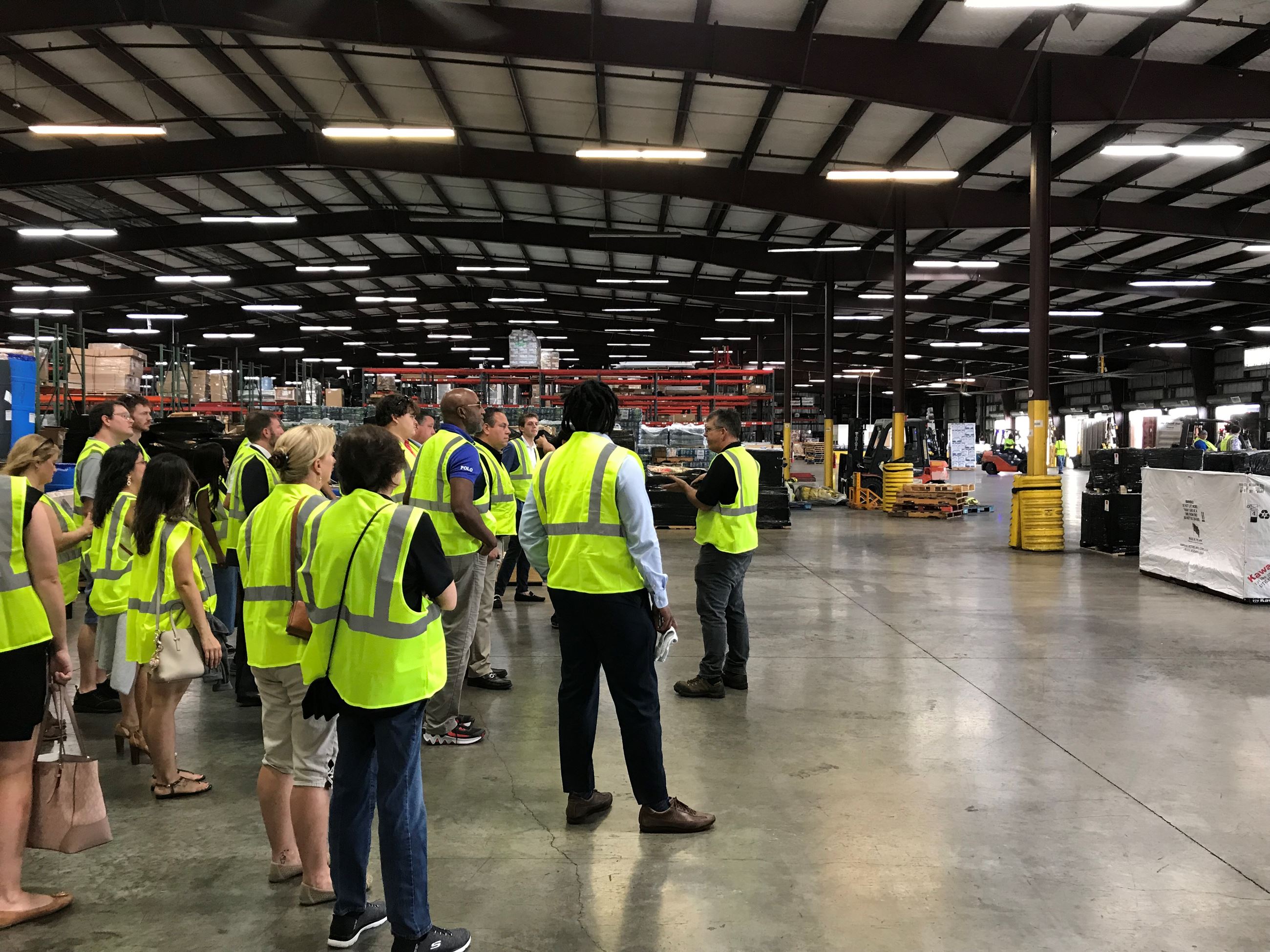Delegtaion touring Tropical Shipping warehouse in Riviera Beach