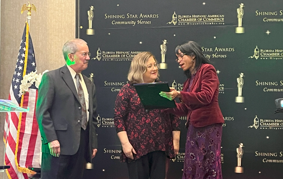 Chairwoman Enright presenting award